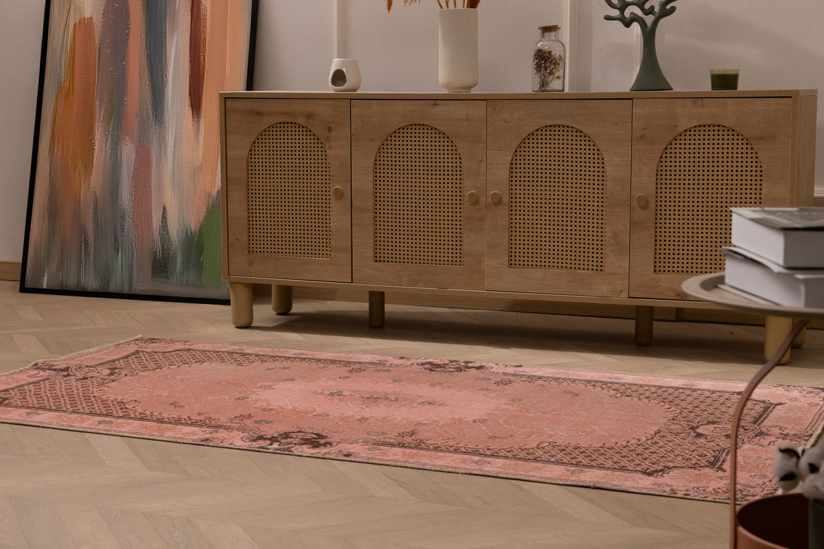 Vintage pink overdyed Turkish area rug with floral patterns, hand-woven wool and cotton, 3x6 ft size.