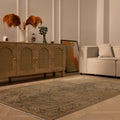Vintage 4x7 ft Kayseri wool and cotton rug in gray and brown with intricate floral patterns in a modern living room.