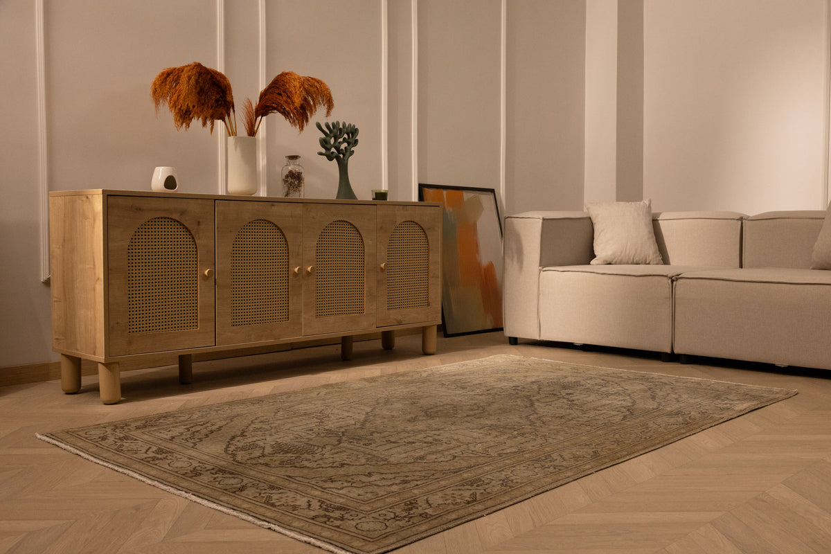 Vintage 4x7 ft Kayseri wool and cotton rug in gray and brown with intricate floral patterns in a modern living room.