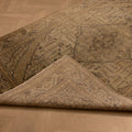 Hand-woven vintage Kayseri rug in gray and brown with floral patterns, 4x7 ft wool and cotton blend on a wooden floor.