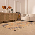 Hand-woven 4x7 ft vintage Turkish rug in orange and beige with a floral medallion design in a modern living room.