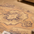 Vintage Nevşehir Turkish Area Rug 4x7 ft — Orange & Navy Medallion