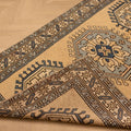 Hand-woven vintage Oushak wool rug in beige and navy with traditional geometric patterns, 3x6 ft.