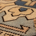 Hand-knotted vintage Oushak wool rug with beige and navy geometric patterns and a textured, low-pile bohemian design.