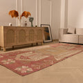 Handwoven vintage Turkish runner rug in red and pink with geometric patterns, 4x11 ft wool and cotton blend.