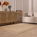 4x5 ft vintage Turkish wool and cotton rug in beige and brown with minimalist floral patterns on a wooden floor.