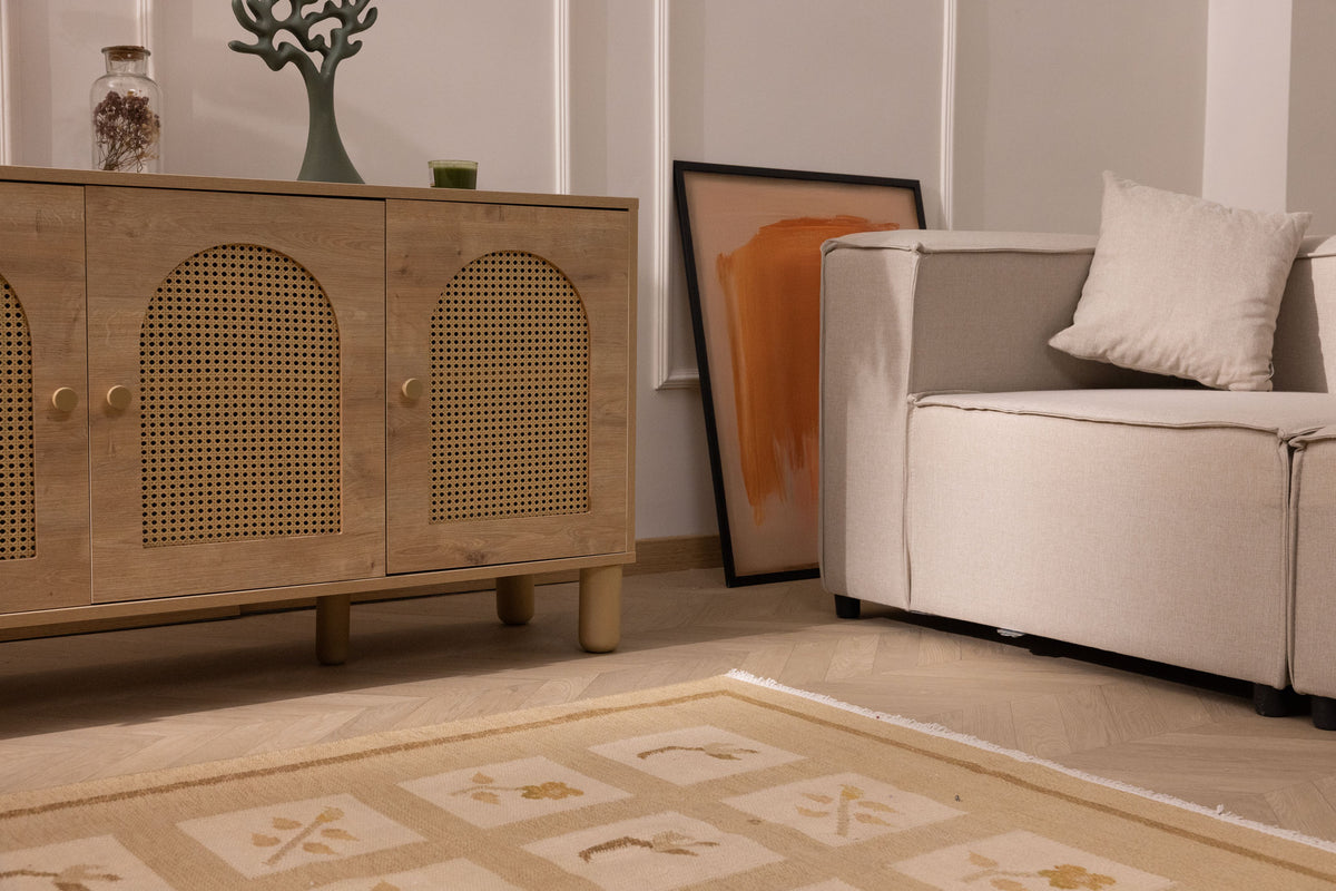 Hand-woven 4x5 ft beige and brown floral Turkish wool rug with minimalist patterns in a modern living room setting.