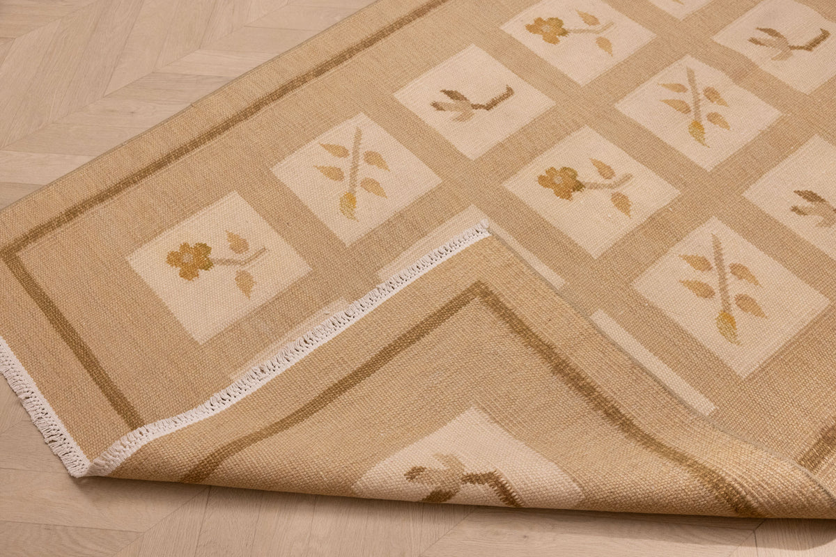 Vintage 4x5 ft beige and brown floral Turkish wool-cotton flatweave rug with a minimalist grid pattern.