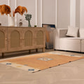 Hand-woven vintage Turkish area rug in orange and beige with geometric patterns, 3x5 ft wool and cotton flatweave.