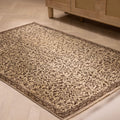 Hand-woven vintage Isparta wool and cotton rug in beige and brown with an intricate floral maximalist pattern.