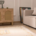 Hand-woven 3x5 ft beige and brown vintage Turkish wool-cotton rug with minimalist striped patterns and fringe detail.