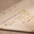 Hand-woven beige and brown vintage Turkish wool-cotton rug, 3x5 ft, featuring minimalist striped and geometric patterns.