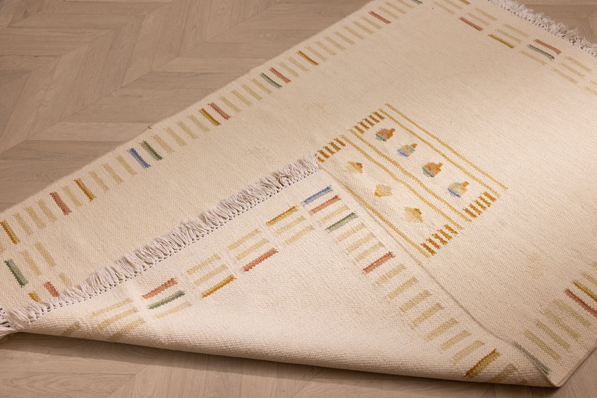 Hand-woven beige and brown vintage Turkish wool-cotton rug, 3x5 ft, featuring minimalist striped and geometric patterns.