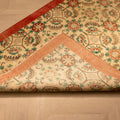 Hand-woven vintage Isparta Turkish runner in white and red with intricate floral patterns and a wool-cotton blend.