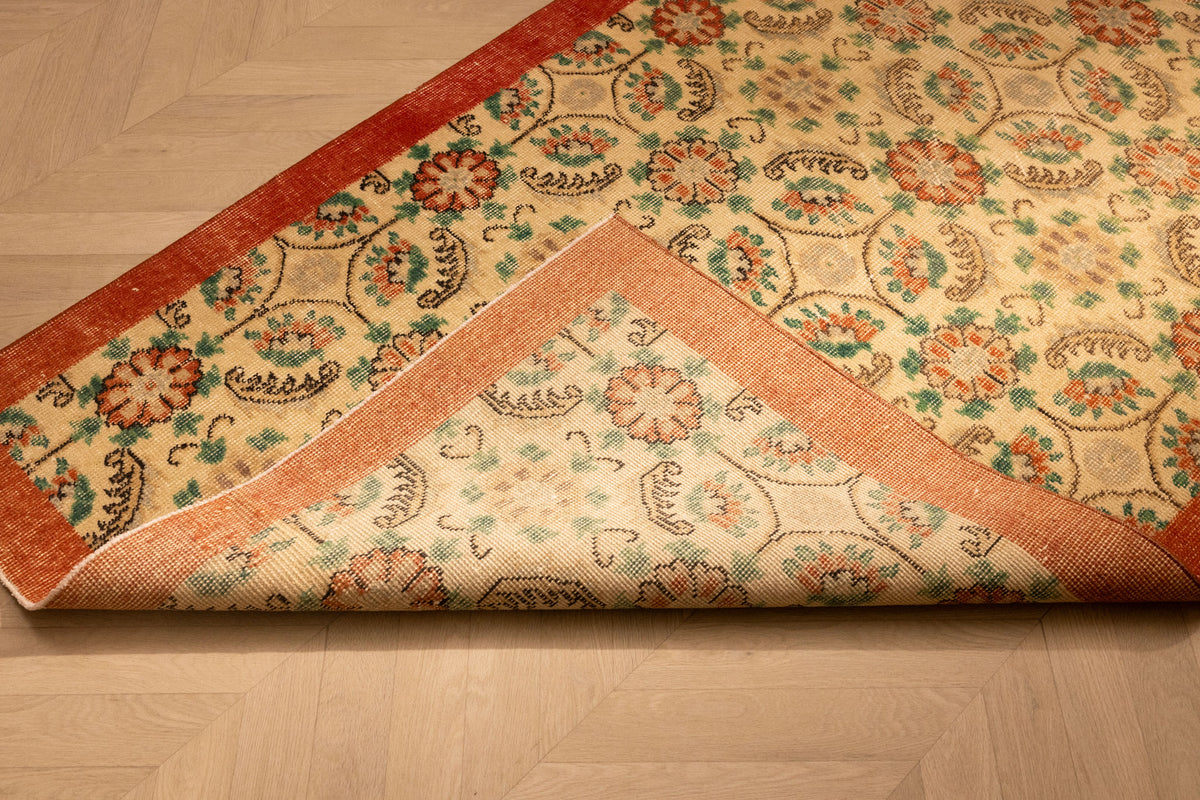 Hand-woven vintage Isparta Turkish runner in white and red with intricate floral patterns and a wool-cotton blend.
