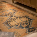 Handwoven vintage Turkish runner rug in orange and brown wool with geometric patterns, 4x11 ft.