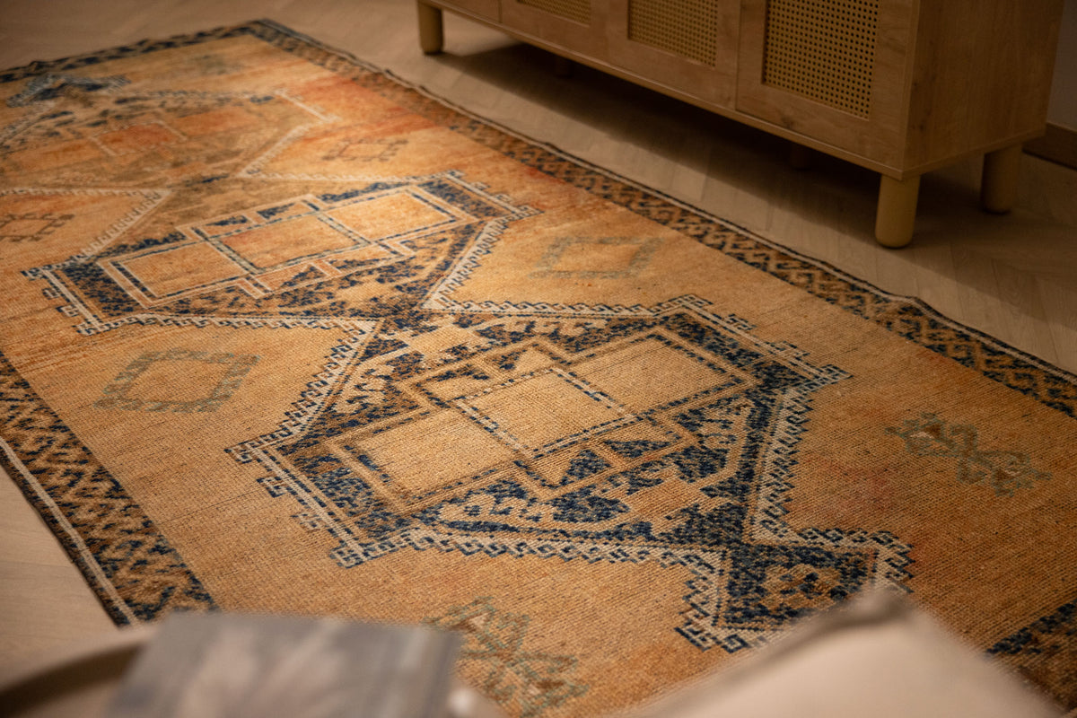 Handwoven vintage Turkish runner rug in orange and brown wool with geometric patterns, 4x11 ft.