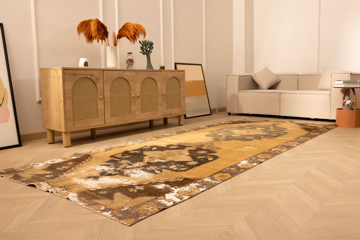 Hand-woven vintage Turkish runner rug in beige and gray with geometric patterns, 4x11 ft wool and cotton blend.