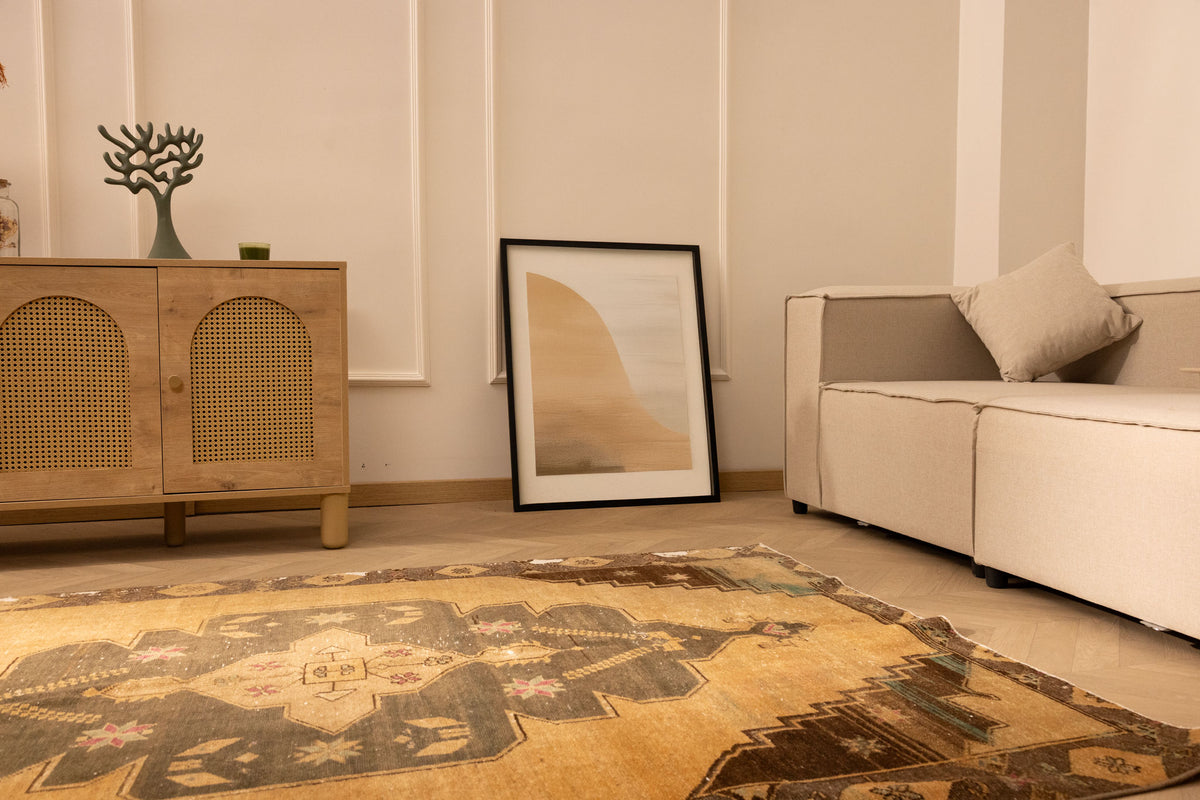 Hand-woven vintage Turkish runner rug in beige and gray with geometric patterns, crafted from wool and cotton.