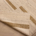 Beige and brown handwoven wool-blend flatweave rug with a striped geometric pattern and a folded corner.