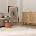 Luxurious, thick-pile white shaggy wool rug with a soft texture, displayed in a cozy, modern living room setting.