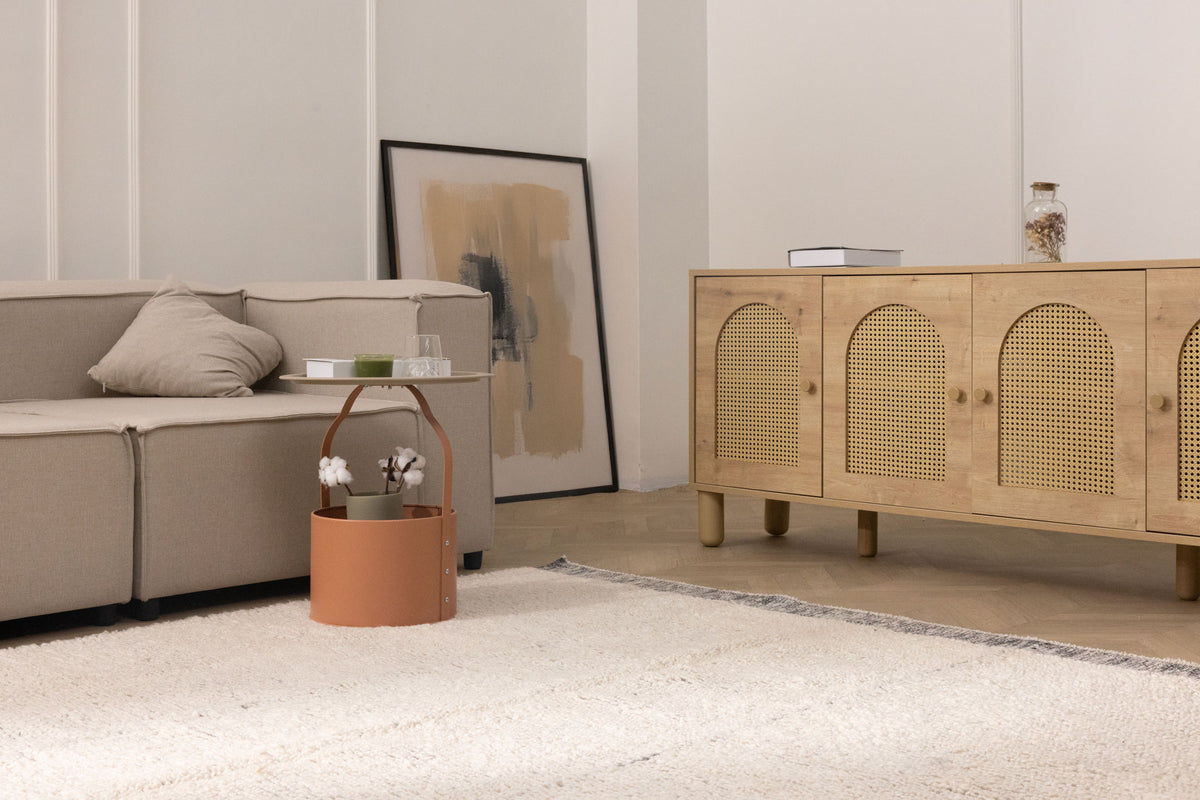 Luxurious, thick-pile white shaggy wool rug with a soft texture, displayed in a cozy, modern living room setting.