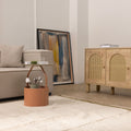 Cream-colored handwoven shaggy wool rug with a thick pile and fringed edges in a cozy, modern living room setting.