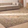 Oversized 10x13 Persian-style wool and cotton rug featuring brown and green floral patterns in a farmhouse living room.