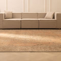 Oversized 9.8x12.8 ft handmade wool and cotton Persian rug in orange and brown with traditional floral patterns.