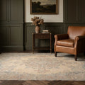 Beige Persian rug in a styled room