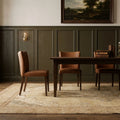 Beige Persian rug in a dining room