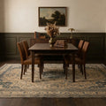 Beige Persian rug in a dining room
