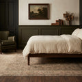 Beige Persian rug in a styled room