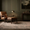 Beige Persian rug in a styled room