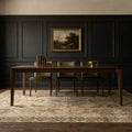 Beige rug in a dining room