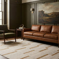 Beige Brown Flatweave area rug in a living room
