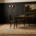 Beige rug in a dining room