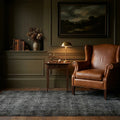 Black Turkish rug in a styled room