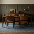 Blue rug in a dining room