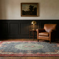 Blue Turkish rug in a conservatory