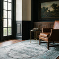 Blue Turkish rug in a den