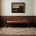 Brown Turkish rug in a hallway