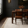 Dark Mustard Shaggy Wool area rug in a dining room