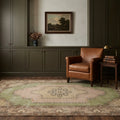 Green Turkish rug in a styled room