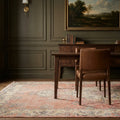 Green Turkish rug in a dining room