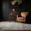 Green Turkish rug in a den