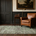Green Turkish rug in a styled room