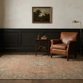 Orange Persian rug in a styled room