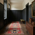Red Persian runner rug in a styled room