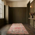 Red Persian runner rug in a styled room